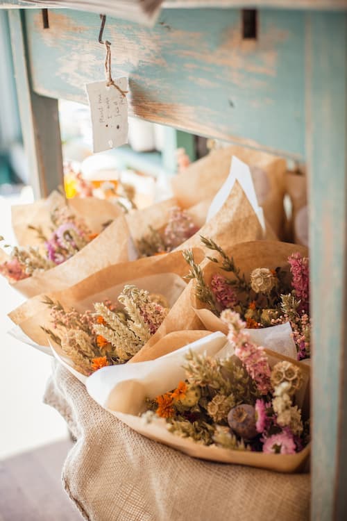 Dried flowers in a steel bucket. Photo by Jutta Klee